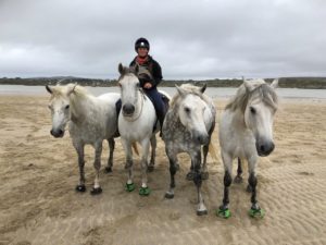 Emma massingale on Beach horses Cavallo Hoof Boots Green Trek
