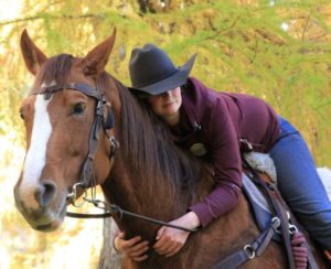 Evelyn Santer hugging horse with Cavallo Saddle Pad