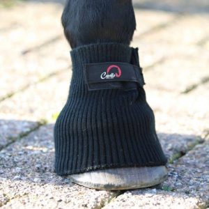 Cavallo hoof boot on horse hoof, providing protection and comfort. Ideal for equine care and riding stability.