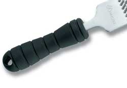 Rubber-handled horse hoof pick, ideal for use with Cavallo hoof boots and equine grooming.