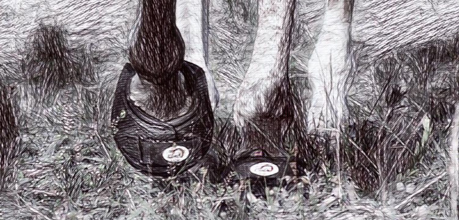 Horse wearing Cavallo hoof boots, standing on grass, showcasing durable equine gear for hoof protection.