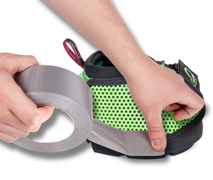 Covering Green Trek drainage slots with duct tape - soaking hoof boot
